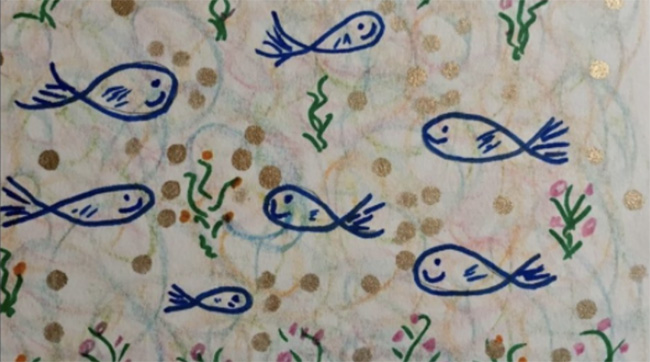 A drawing of a group of fish swimming